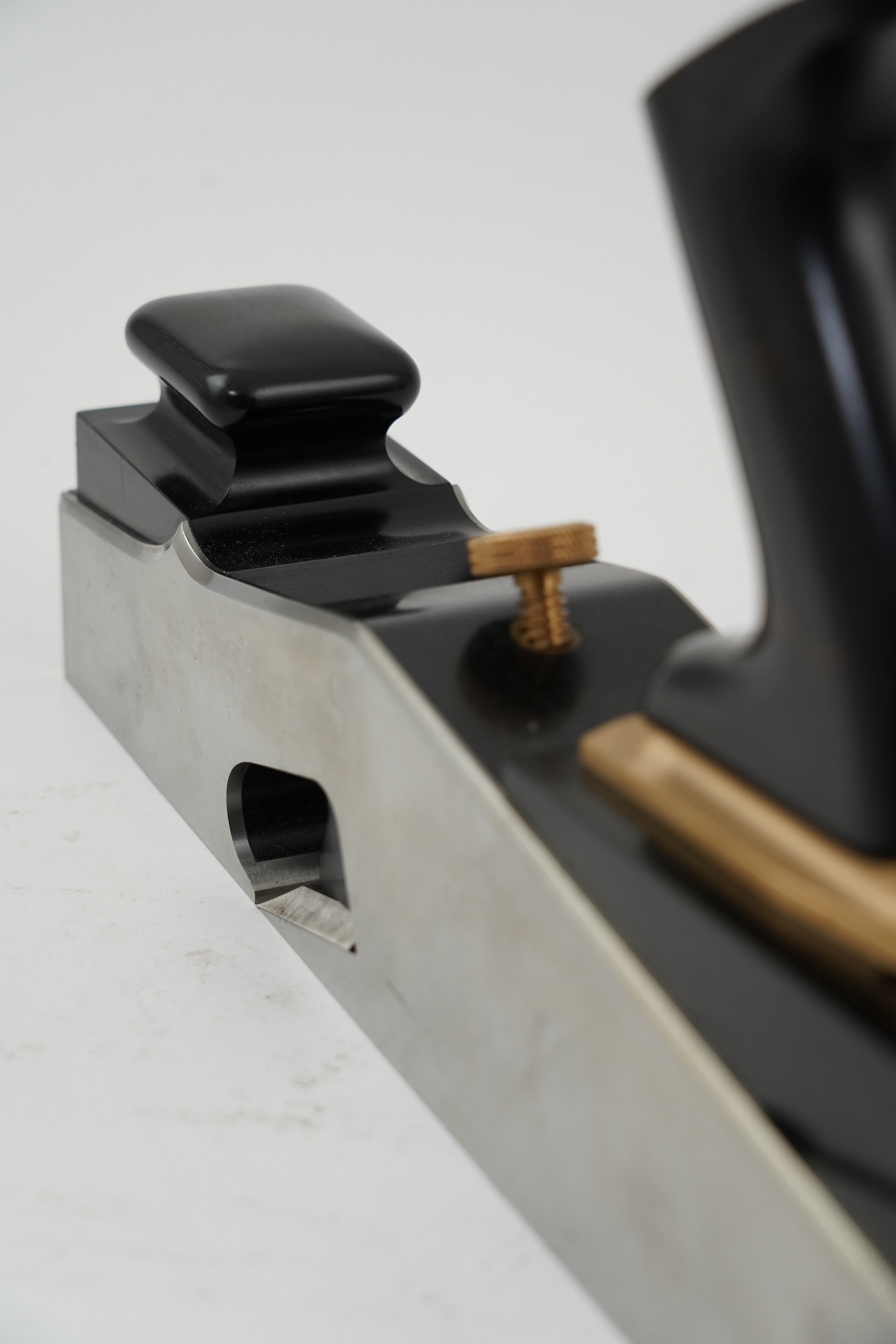 A very fine modern rebate mitre plane by Sauer & Steiner Toolworks, Ontario, handmade in the style of a Norris rebate mitre plane, with ebony infill, handle and wedge, adjustable iron, the handle on an adjustable lateral
